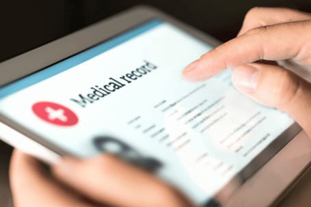 tablet with medical records screen